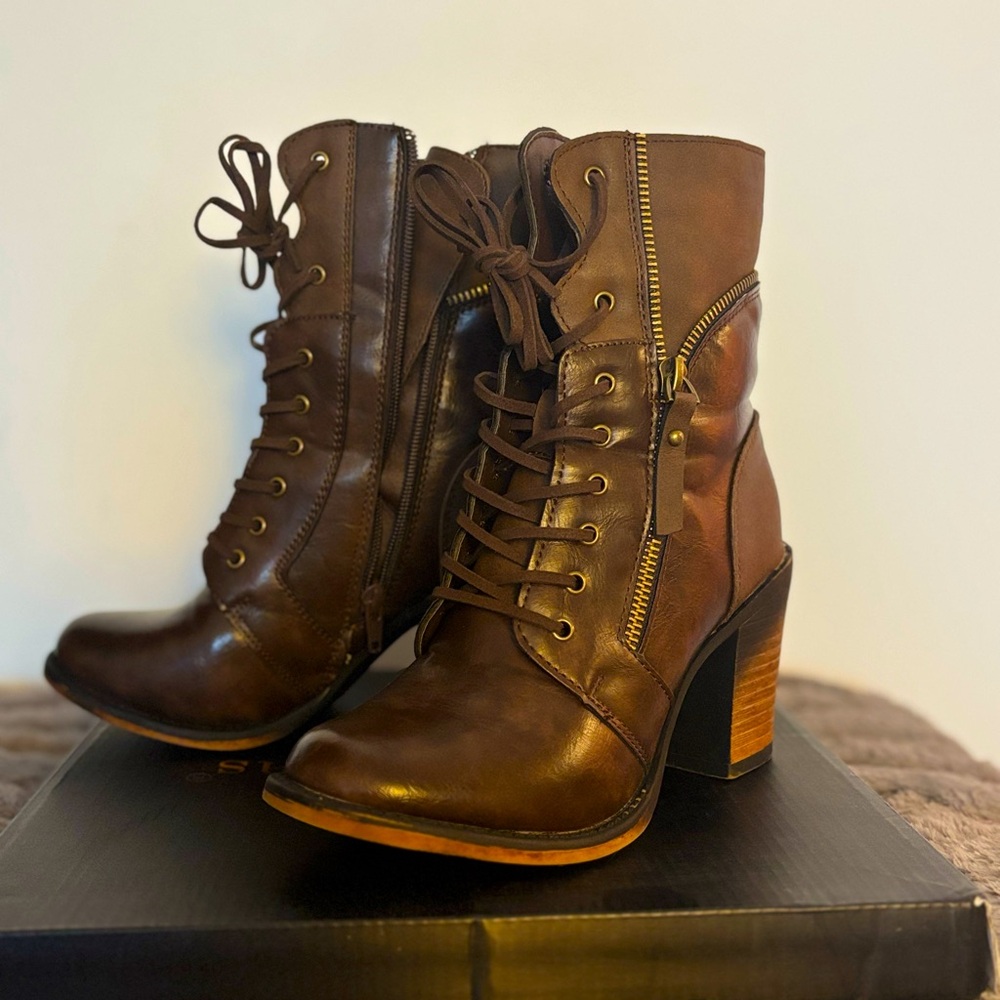 Selling brown heeled boots size 6. Only worn once, still in great condition.